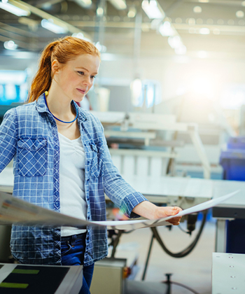 lady carrying a print out 